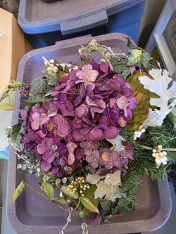 Christmas Decor. Hydrangea center piece and bucket full of pinecones.