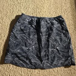 navy blue skirt with white leaves pattern
