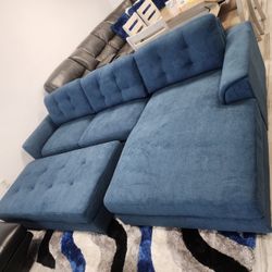 Biscayne Blue Fabric Sectional Sofa And Ottoman Set
