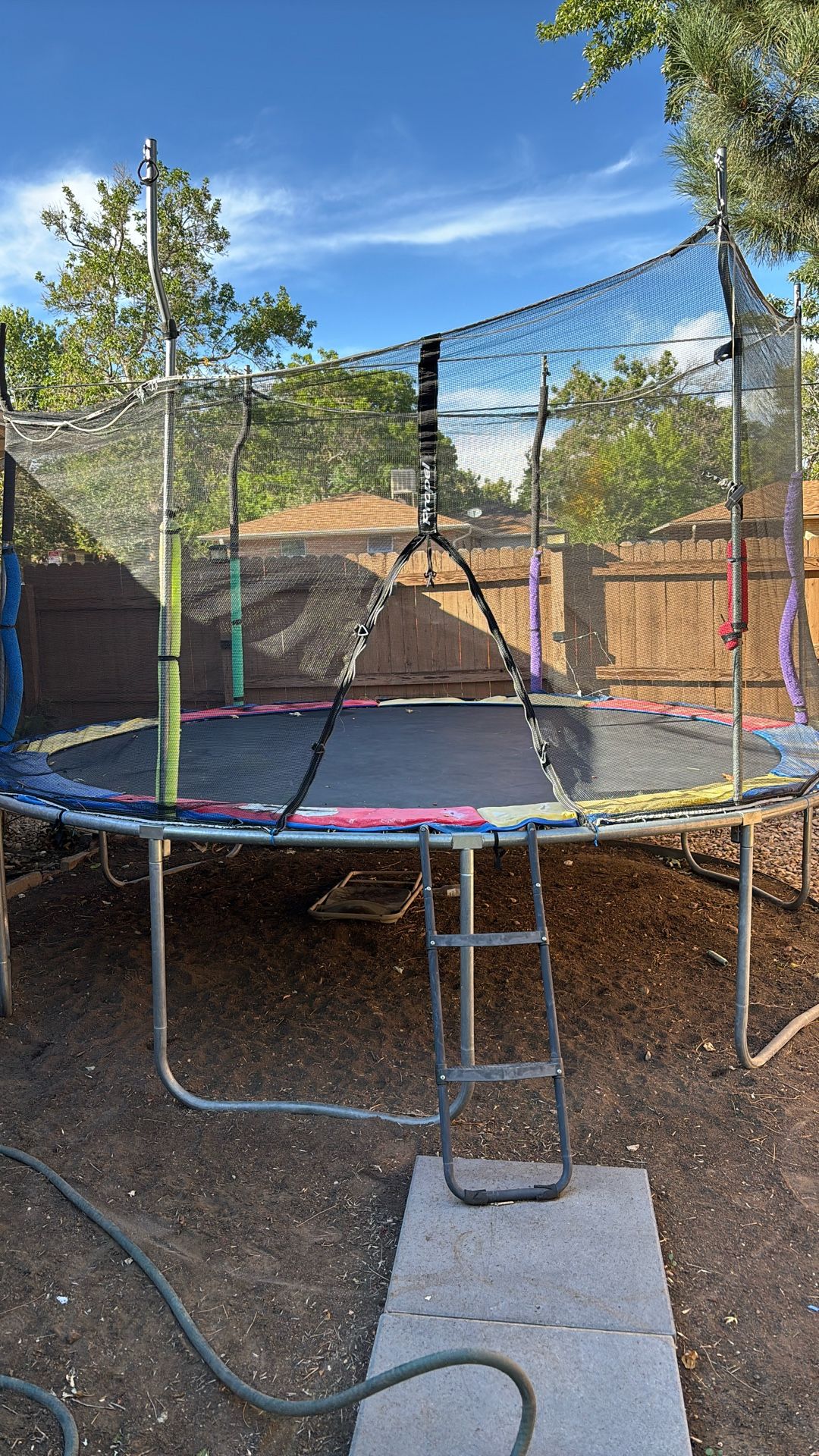 Trampoline For Sale.  In Good Condition 12 ft With Pad and Trampoline Ladder 