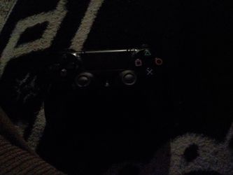 Black PlayStation 4 controller