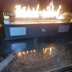 New Bluetooth Speaker propane fire pit new in box sells for 400 at lowes