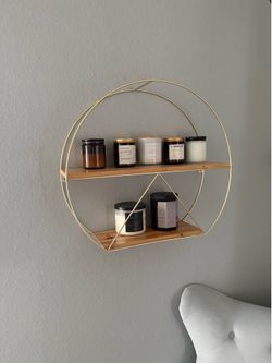 Wall mounted circular shelf