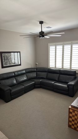 Sectional leather reclining couch
