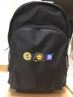 GM / American made Airport / Backpack/ Traveler Bag. Telescoping handle w/wheels! H-21”x W 13”x D 8”