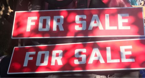 Two for sale signs