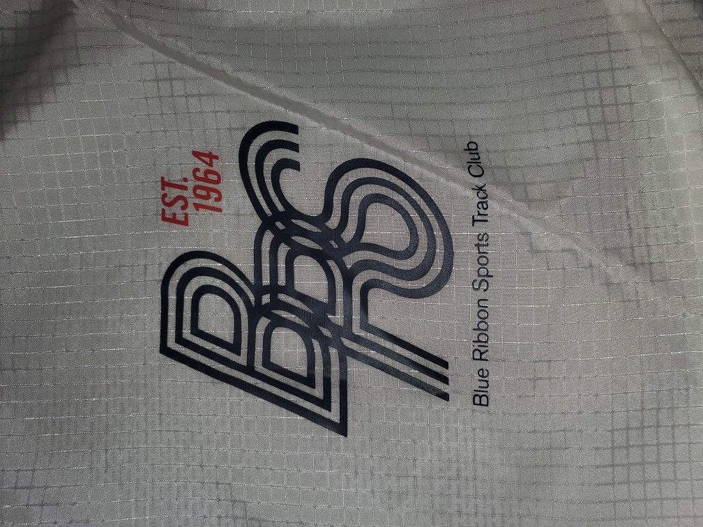 Nike Blue Ribbon Sports Track Club Packable Running Jacket