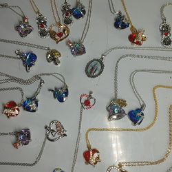 24 necklaces / pendants / amulets - Brand New Unused
