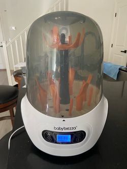 Baby Brezza Baby Bottle Sterilizer and Dryer Machine Electric Steam Sterilization - Pacifiers, Glass, Plastic, and Newborn Feeding Bottles