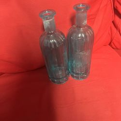 Two Light Blue Glass Bottles 