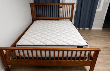 Queen size wooden bed