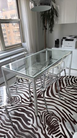 Room and board glass table with chairs