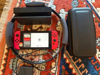 Nintendo Switch with Ring Fit Adventure, dock, case