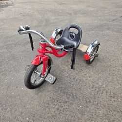 Red Schwinn Roadster Tricycle