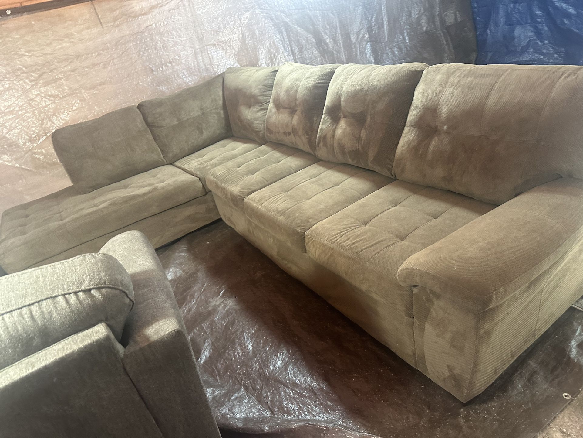 Brown L-shaped couch with ottoman great condition clean we sell all the time delivery extra 40 local