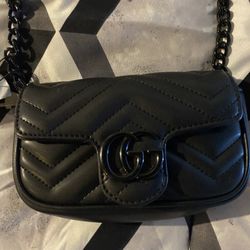 Gucci Mormont Quilted Clutch 