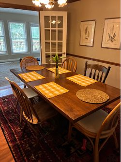 Solid oak wood dining table (can seat 6 to 8)