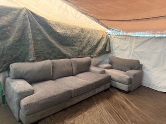 Gray couch with matching oversized chair good condition clean we saw all the time delivery $40 local