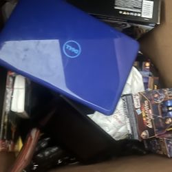Box Full Of Action Figures Laptop And Tablet 