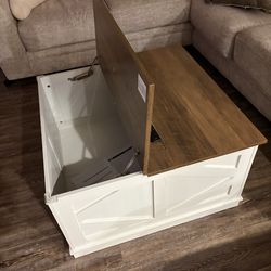 White lift top coffee table with storage