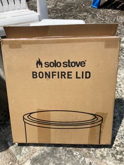 Open box solo stove lid and cover