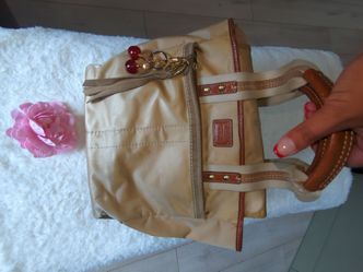 Coach nylon and leather bag with charms