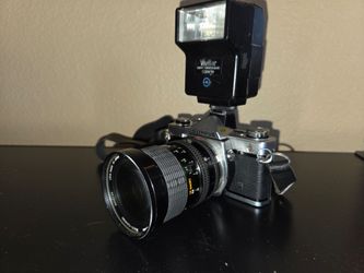 Olympus 35mm  sigma zoom lens tripod