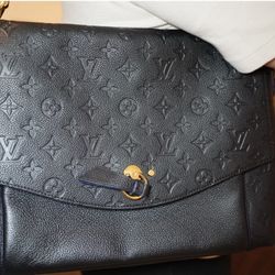  Louis Vuitton Blanche MM, crafted from black Monogram Empreinte 