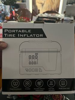 Tire inflator and battery pack