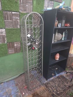 Wine rack Arched Metal Wine Rack 6 foot tall.  99. Black shelf 49