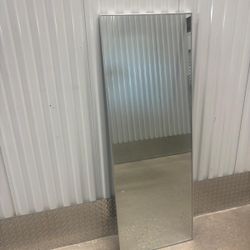 Silver chrome frame full dress back of the door mirror…. 20” x 55” . $50