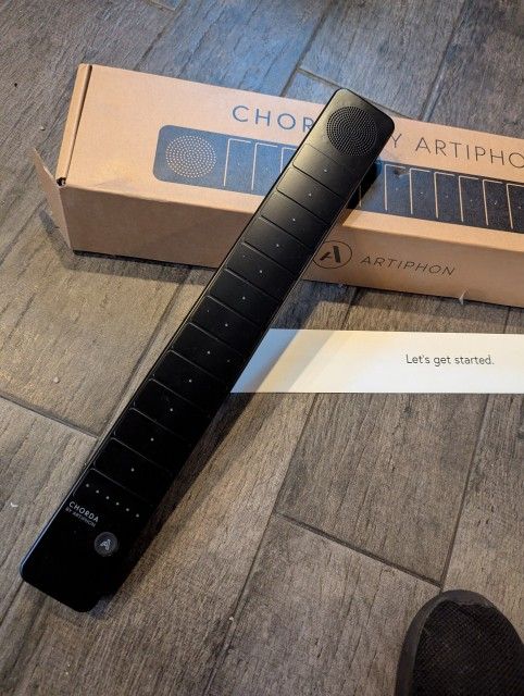 Artiphon Chorda 12-pad looper, sampler, synth, and controller with strummable bridge. Handheld Instrument