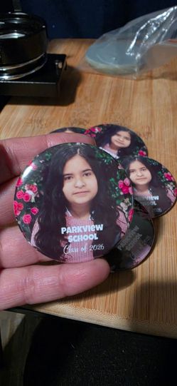 2 1/4 inch: Custom buttons, mirrors, and magnet/bottle openers