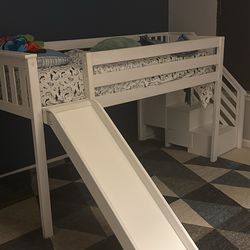 Children’s bed frame with slide