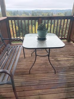 Outdoor Patio Glass Top Table and 4 red chairs
