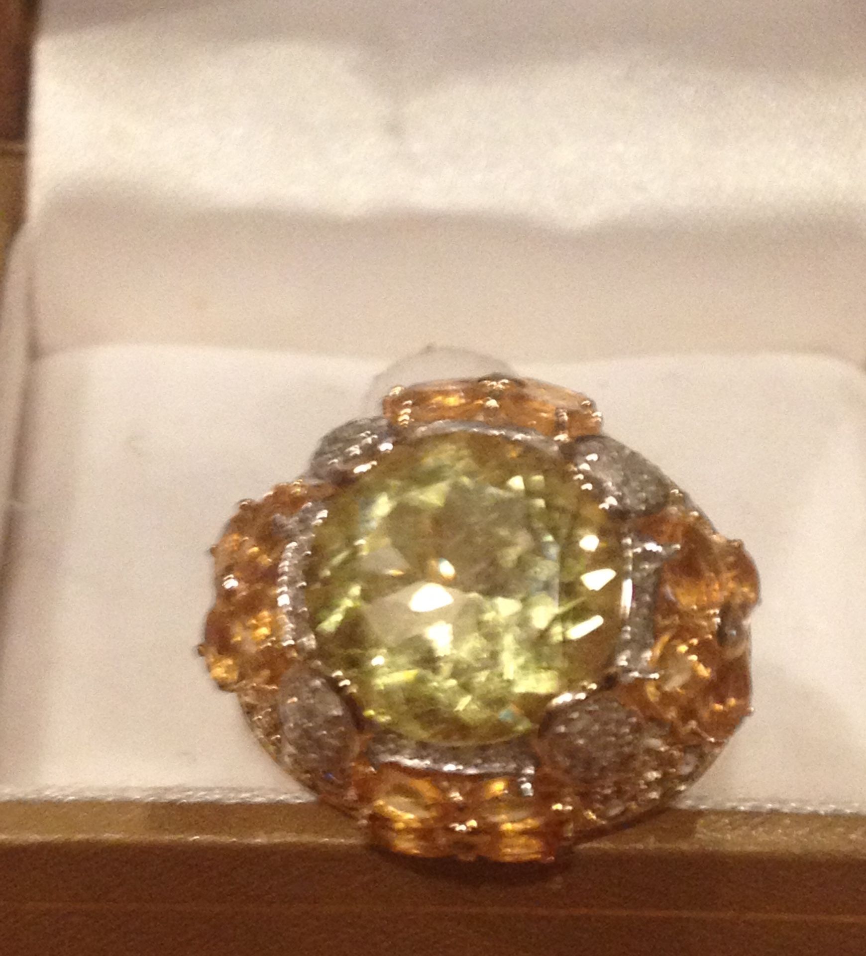 Ladies ultra couture green sapphire,diamond,citrine ring. Size7