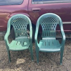 2 Plastic Hard Chairs 
