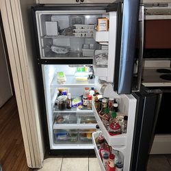 Barely Used GE Silver Refrigerator