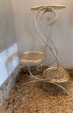 Gold plant holder