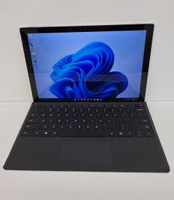 Microsoft Surface Pro 4 

Windows 11
 Intel Core i5
 8GB RAM 
256GB SSD