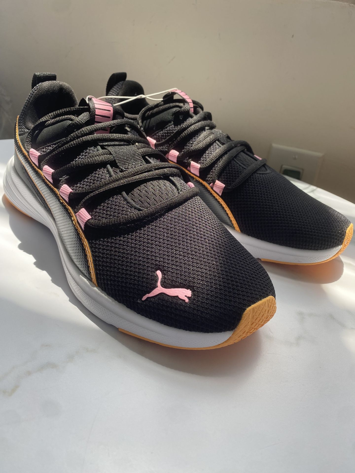 Puma Black and Pink Athletic Shoes