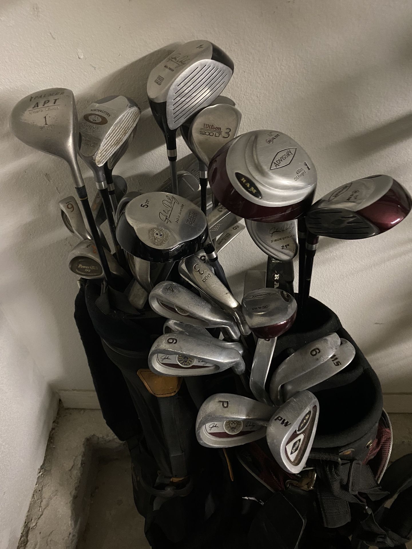 2 Sets Of Golf Clubs
