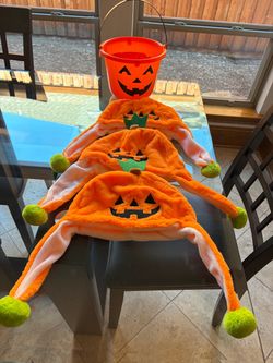 Halloween Pumpkin Jester Hats (3) and Jack-O’-Lantern candy bucket
