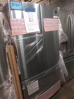 NEW Samsung french doors refrigerator with internal water dispenser in stainless steel