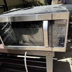 Smaller Microwave. And Other Shelving Items 
