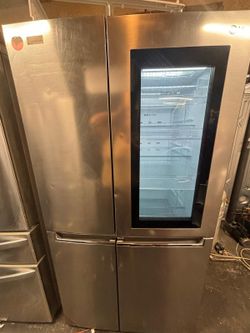 LG COUNTER DEPTH STAINLESS STEEL REFRIGERATOR HAS SOME DENTS 