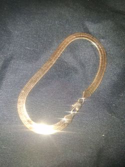 vintage solid 14k yellow gold herringbone chain bracelet.