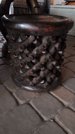 Small carved accent table wooden