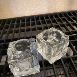 Two matching rare candle holders 