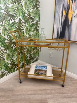 Gold and glass bar cart
